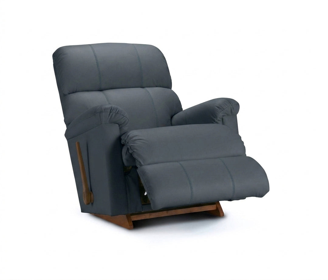 Deep blue full leather rocker recliner with padded armrests, reclined seat, wood base