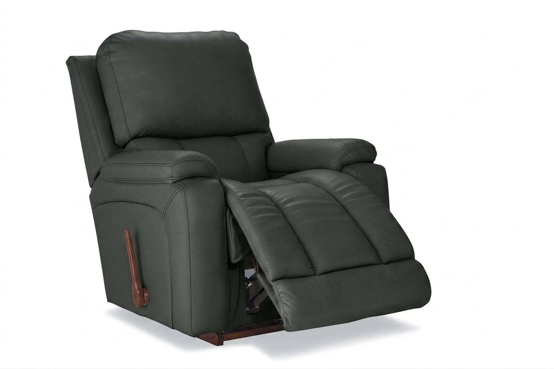 Dark charcoal leather rocker recliner with padded arms and reclining footrest