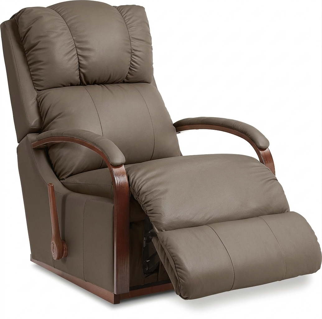 Taupe full-leather rocker recliner with tufted headrest, curved wooden armrests, and ottoman
