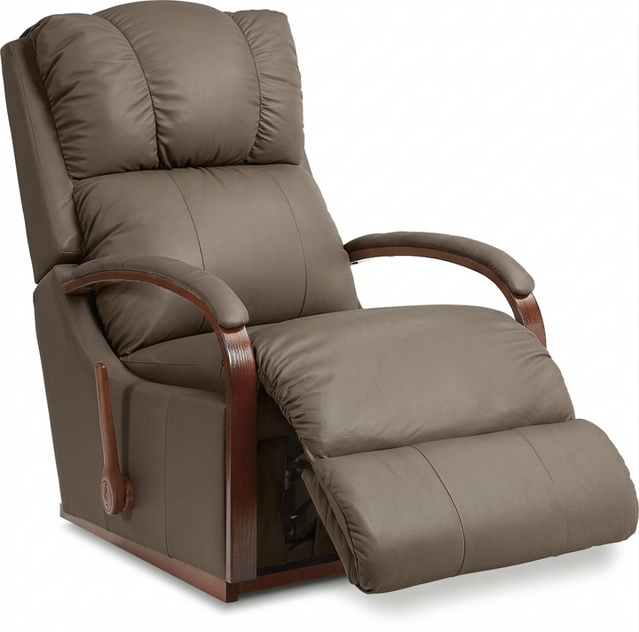 Taupe full-leather rocker recliner with tufted headrest, curved wooden armrests, and ottoman