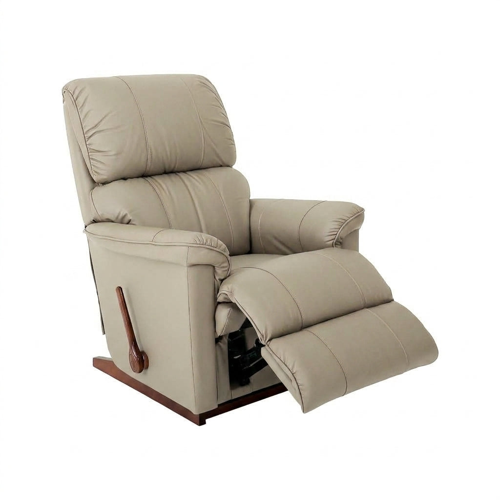 Light beige leather rocker recliner with padded armrests and extended footrest.