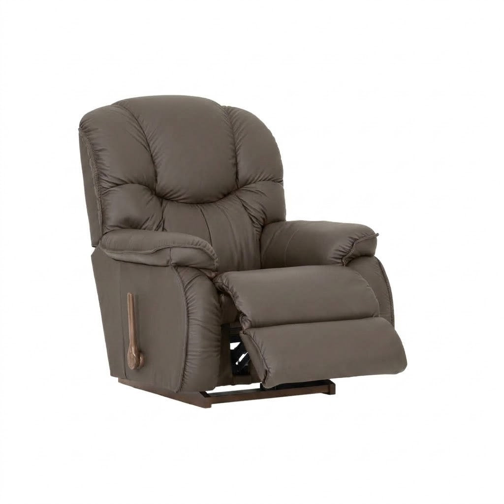 Pebble full leather rocker recliner with padded arms, button-tufted back, and footrest