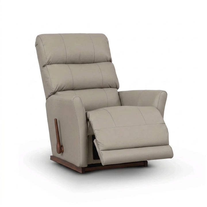 Light tan leather rocker recliner with padded arms, reclining seat, and wooden base