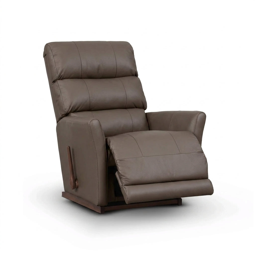 Brown leather rocker recliner with padded arms, reclining seat, and wooden base