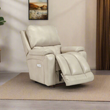 Full leather power rocker recliner in light beige, reclined with footrest raised