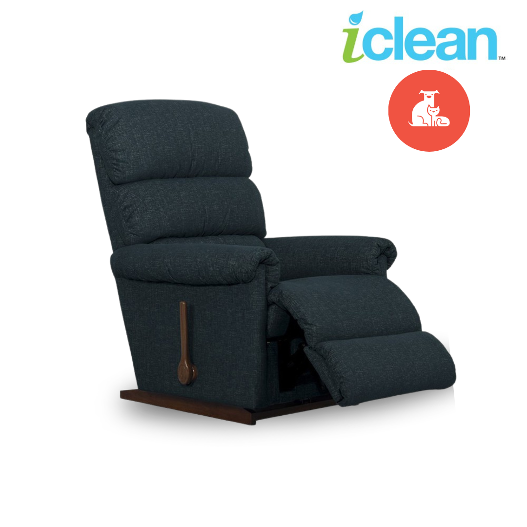 Dark fabric rocker recliner, side angle with fold-down footrest and padded armrests