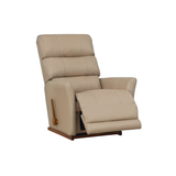 Light beige leather-look rocker recliner with padded arms and recline footrest