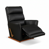 Black leather-look recliner chair with extended footrest and side handle, angled view