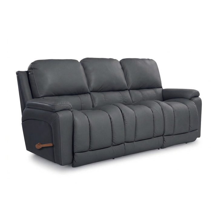 Leather motion reclining sofa in dark gray, padded arms, recline sections, wood pull tab.