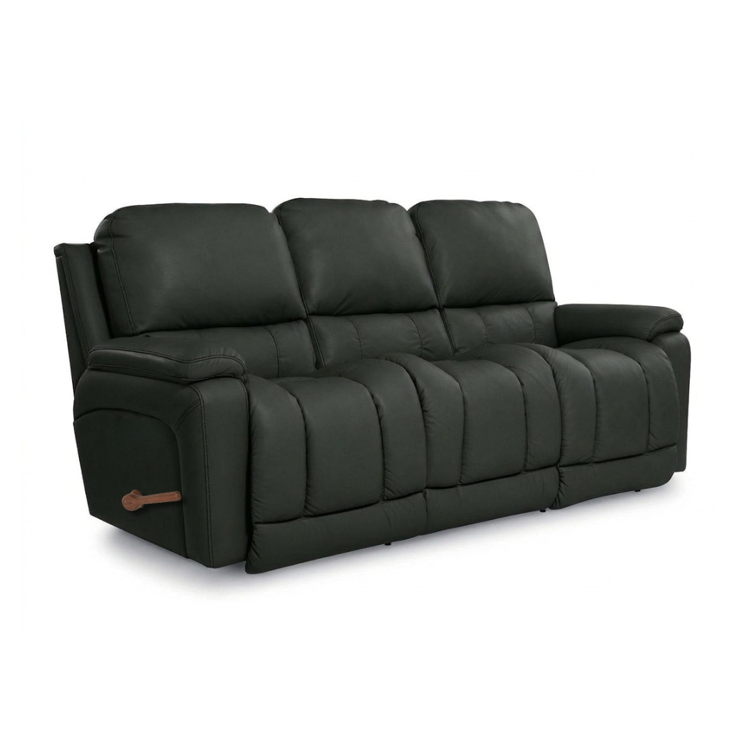 Leather motion reclining sofa in dark green, padded arms, recline panels, wood pull tab.