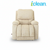 Light beige fabric rocker recliner with padded arms and segmented back cushion