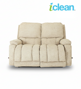 Reclining loveseat with light beige fabric, wide padded seat and two back cushions