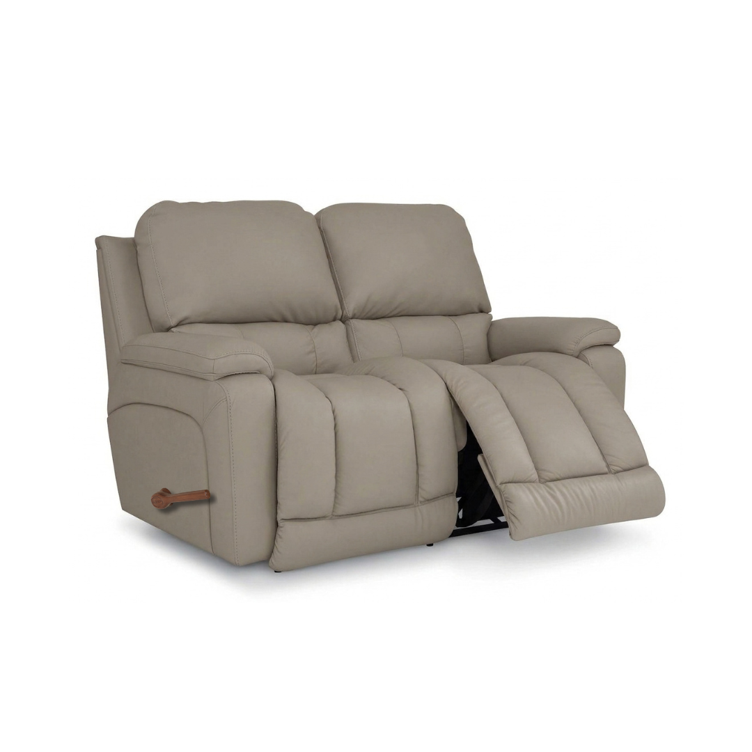 Stone beige full-leather motion reclining loveseat with extended footrest