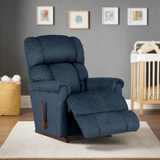 Dark blue upholstered rocker recliner chair with rounded headrest and arm pads