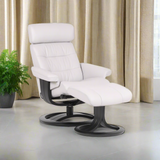 White leather swivel pedestal lounge chair with footrest and black rotating base
