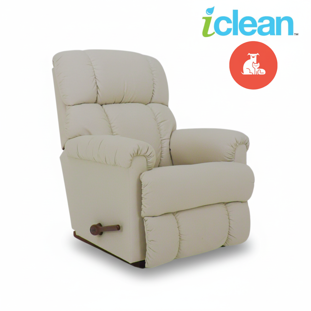 Cream fabric rocker recliner with rolled arms and side pull handle, padded backrests