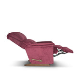Fabric rocker recliner chair in dark plum velvet with wide padded back and armrests
