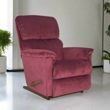 Fabric rocker recliner in dark plum with tufted back, padded arms, and side handle