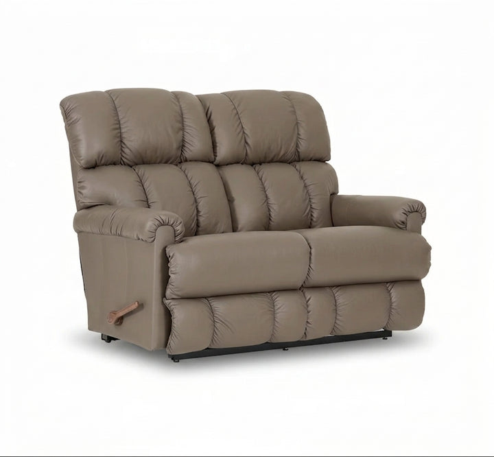 Pebble full-leather reclining loveseat with tufted back and wide padded arms