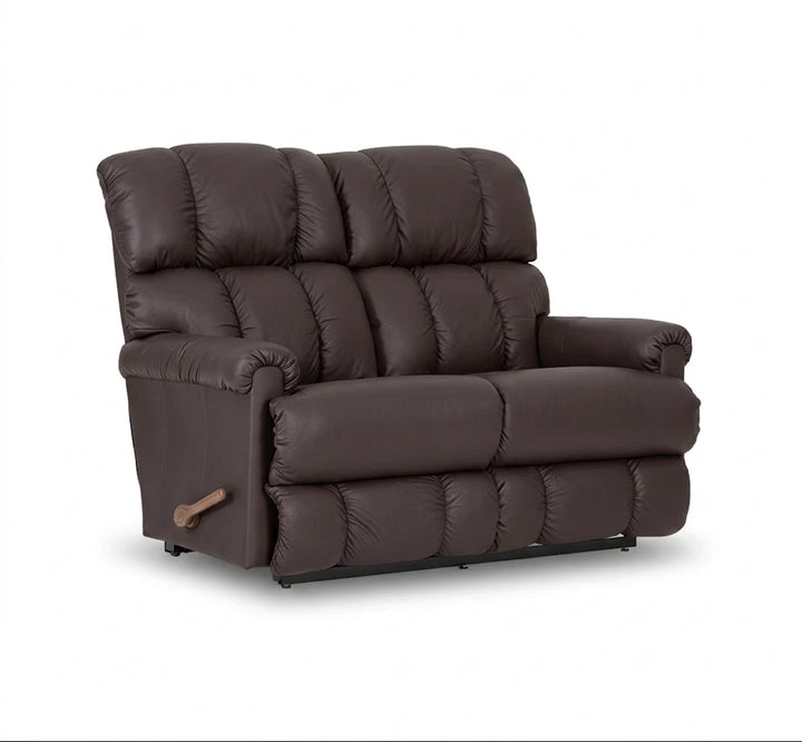 Dark brown full-leather reclining loveseat with tufted back and padded armrest
