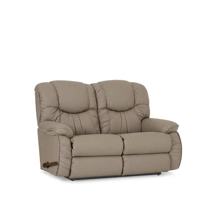 Mushroom leather reclining loveseat with padded arms and tufted back cushions