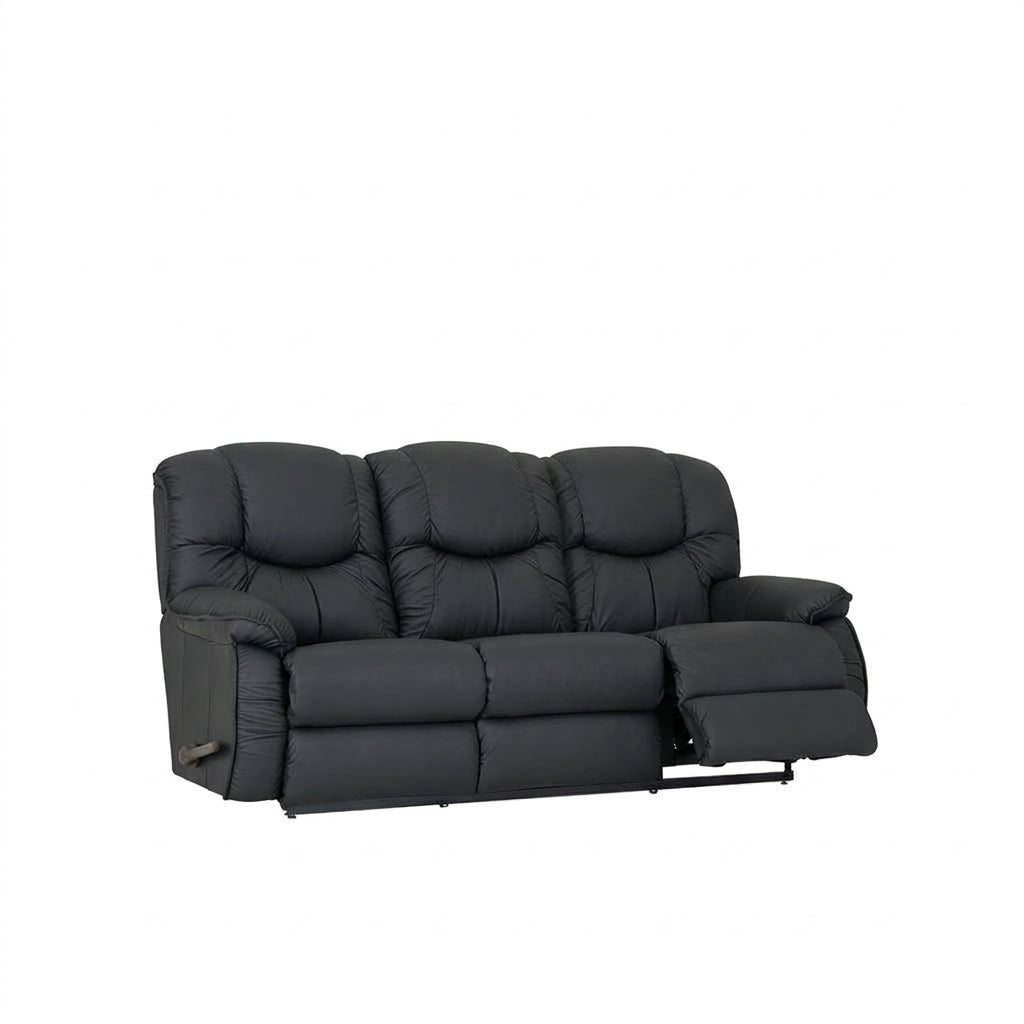 Black full-leather reclining sofa with drop-down table, tufted back and padded chaise