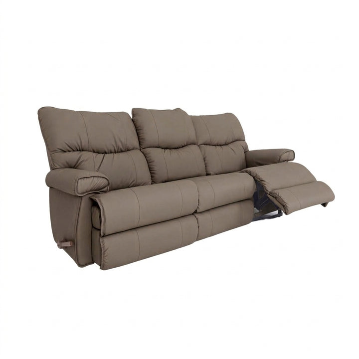 Leather motion reclining sofa in pebble brown leather, tufted back and reclining footrests