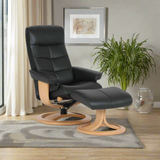 Black leather recliner chair with ottoman and round wooden pedestal base