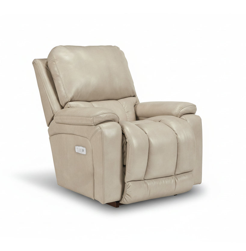 Full leather power rocker recliner in light beige, padded arms and headrest