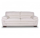 DEXTER Signature sofa in light white leather, front view with padded arms and tufted cushions