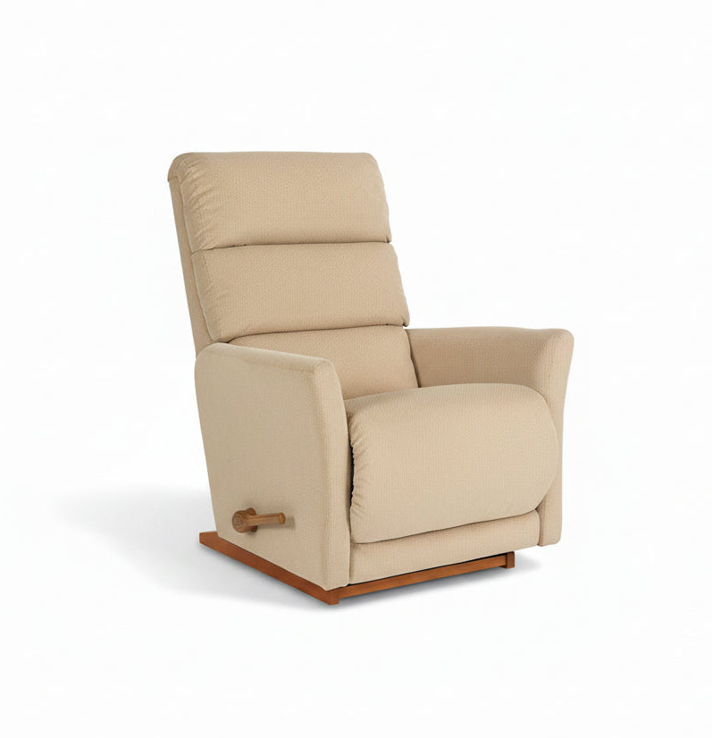 Beige fabric rocker recliner, front three-quarter view with arm latch.