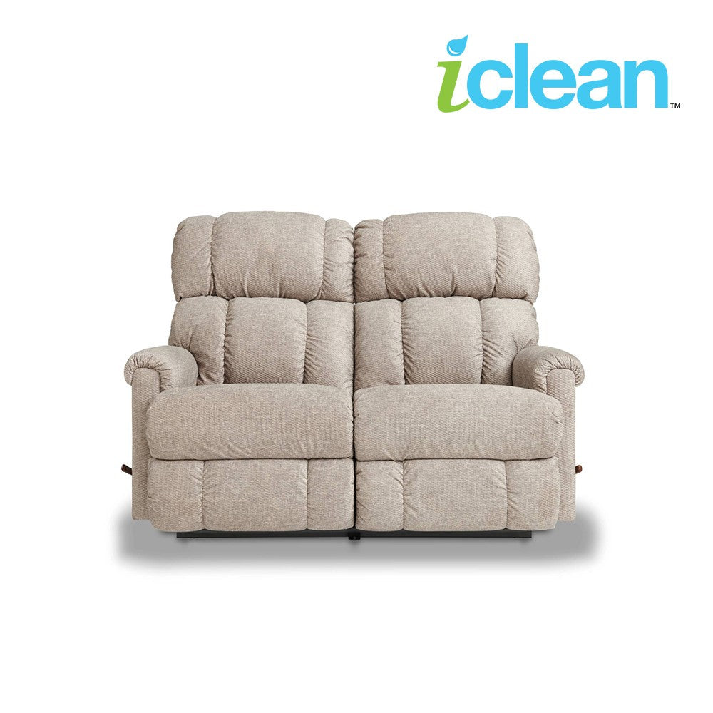 Ash fabric reclining loveseat viewed front, padded back and segmented seat cushions