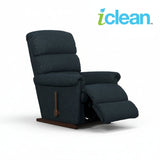 Dark blue fabric rocker recliner with reclining footrest extended, side view