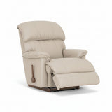 Beige full leather rocker recliner with recline ottoman, armrest lever visible