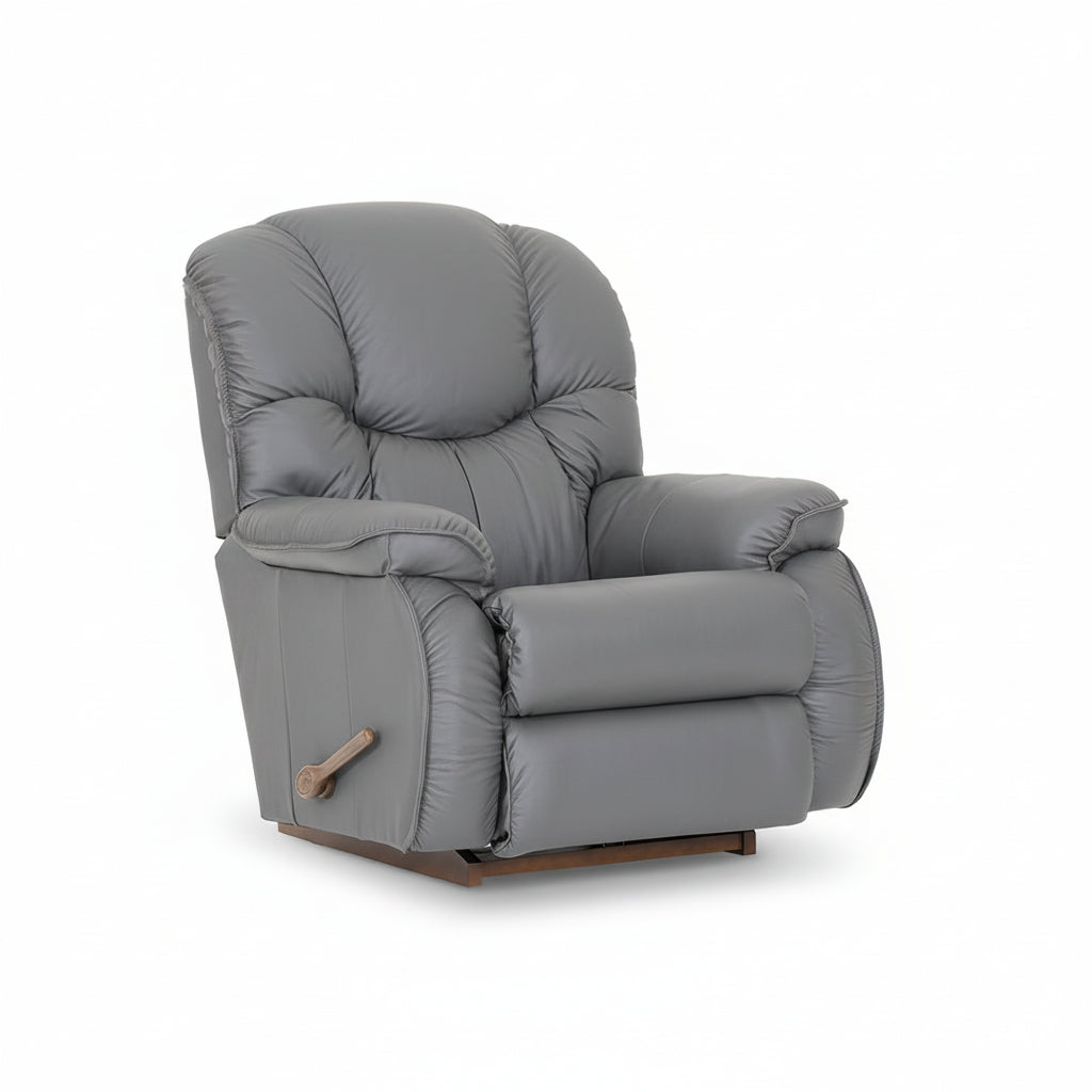 Gray full leather rocker recliner with tufted back, padded arms, side control handle
