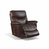 Dark leather rocker recliner with extended footrest and side control handle