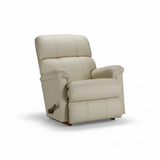 Cream leather rocker recliner with padded arms and headrest